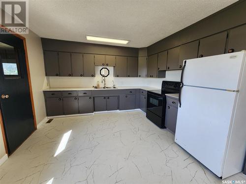 121 Mission Road, Grayson, SK - Indoor Photo Showing Kitchen With Double Sink