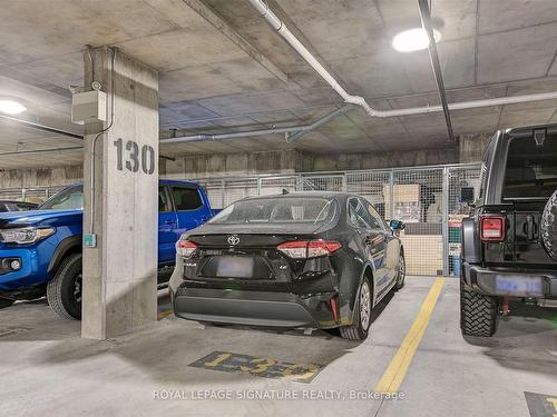 608-302 Essa Rd, Barrie, ON - Indoor Photo Showing Garage