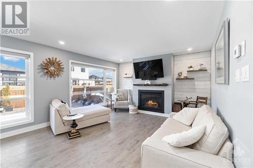 313 Nature Street, Casselman, ON - Indoor Photo Showing Living Room With Fireplace