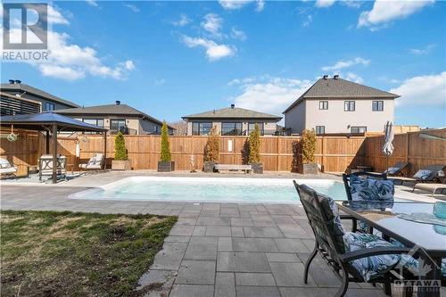 313 Nature Street, Casselman, ON - Outdoor With In Ground Pool