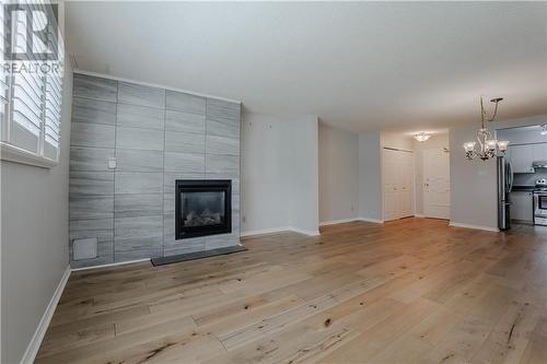 121 Water Street W Unit#112, Cornwall, ON - Indoor Photo Showing Living Room With Fireplace