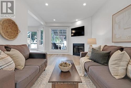 16 Resnik Drive, Clarington (Newcastle), ON - Indoor Photo Showing Living Room With Fireplace