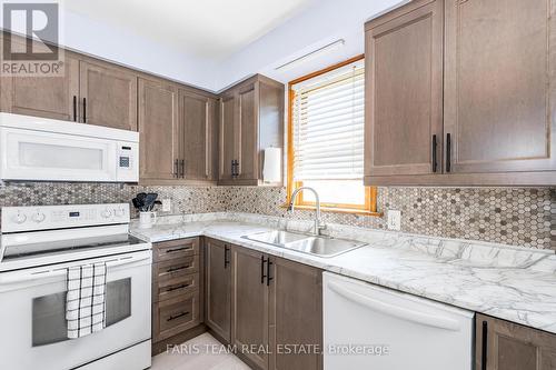 15 George Street, Innisfil, ON - Indoor Photo Showing Kitchen With Double Sink