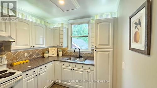 81 East 11Th Street, Hamilton, ON - Indoor Photo Showing Kitchen With Double Sink