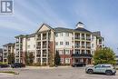 229 - 80 Aspen Springs Drive, Clarington (Bowmanville), ON  - Outdoor With Balcony With Facade 