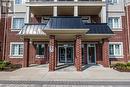 229 - 80 Aspen Springs Drive, Clarington (Bowmanville), ON  - Outdoor With Balcony With Facade 