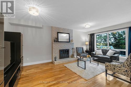 12 Autumn Drive, Caledon, ON - Indoor Photo Showing Living Room With Fireplace