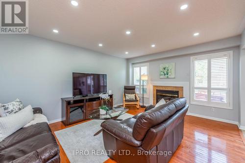 17 Frontenac Crescent, Brampton (Fletcher'S Meadow), ON - Indoor Photo Showing Living Room With Fireplace