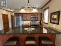 200 Bighorn  Boulevard Unit# 211D, Radium Hot Springs, BC  - Indoor Photo Showing Kitchen With Double Sink 