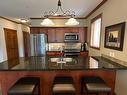 211D - 200 Bighorn Boulevard, Radium Hot Springs, BC  - Indoor Photo Showing Kitchen With Double Sink 