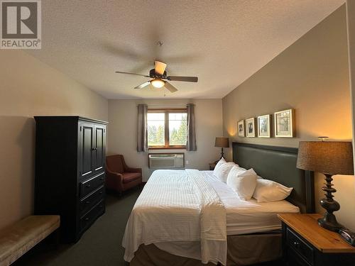 200 Bighorn  Boulevard Unit# 211D, Radium Hot Springs, BC - Indoor Photo Showing Bedroom