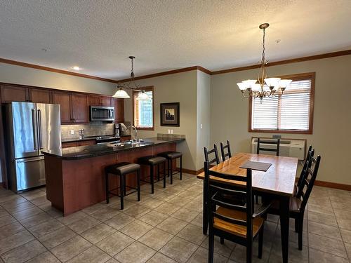 211D - 200 Bighorn Boulevard, Radium Hot Springs, BC - Indoor Photo Showing Dining Room