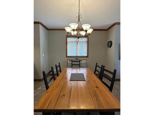 211D - 200 Bighorn Boulevard, Radium Hot Springs, BC - Indoor Photo Showing Dining Room