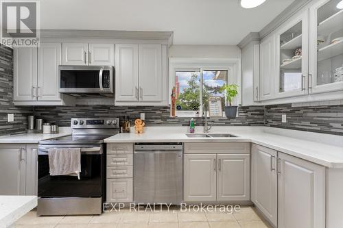 54 - 1290 Bridletowne Circle, Toronto (L'Amoreaux), ON - Indoor Photo Showing Kitchen With Double Sink