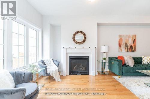 48 Blackwell Crescent, Bradford West Gwillimbury, ON - Indoor Photo Showing Living Room With Fireplace