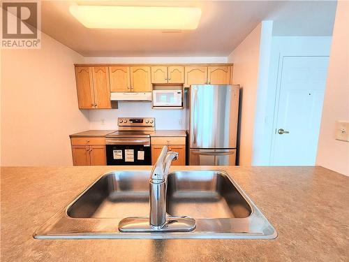 50 Assomption Boulevard Unit# 302, Moncton, NB - Indoor Photo Showing Kitchen With Double Sink