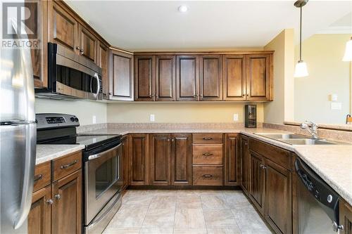 185 Royal Oaks Boulevard Unit# 207, Moncton, NB - Indoor Photo Showing Kitchen With Double Sink