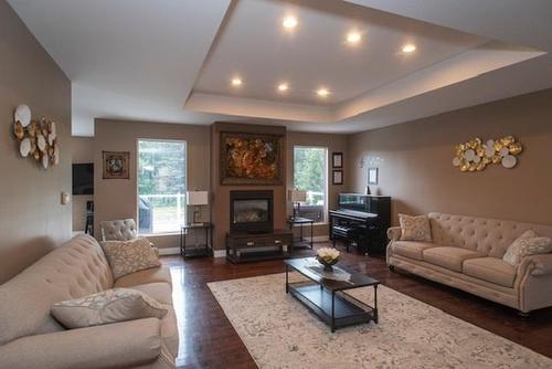 1012 Foxborough Place, Thunder Bay, ON - Indoor Photo Showing Living Room With Fireplace