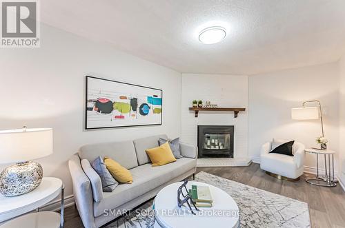 6516 Warbler Lane, Mississauga (Lisgar), ON - Indoor Photo Showing Living Room With Fireplace