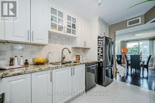 302 - 1071 Queens Avenue, Oakville (College Park), ON - Indoor Photo Showing Kitchen With Double Sink With Upgraded Kitchen