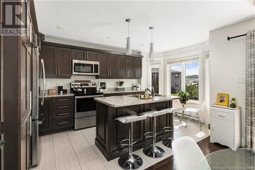 25 Perfection, Dieppe, NB - Indoor Photo Showing Kitchen With Stainless Steel Kitchen With Upgraded Kitchen