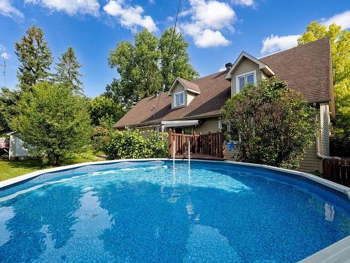 Piscine - 148 25E Avenue, Bois-Des-Filion, QC - Outdoor With Above Ground Pool With Backyard