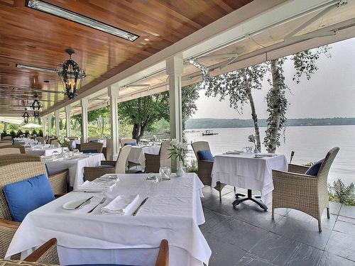 Dining room - 114-700 Ch. Ripple Cove, Ayer'S Cliff, QC - Outdoor With Body Of Water With Deck Patio Veranda