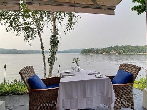 Dining room - 114-700 Ch. Ripple Cove, Ayer'S Cliff, QC - Outdoor With Body Of Water With View