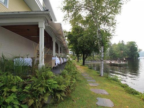 Dining room - 114-700 Ch. Ripple Cove, Ayer'S Cliff, QC - Outdoor With Body Of Water