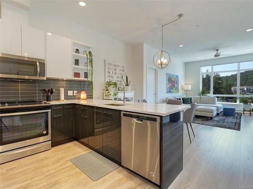 603-1311 Lakepoint Way, Langford, BC - Indoor Photo Showing Kitchen With Stainless Steel Kitchen With Upgraded Kitchen