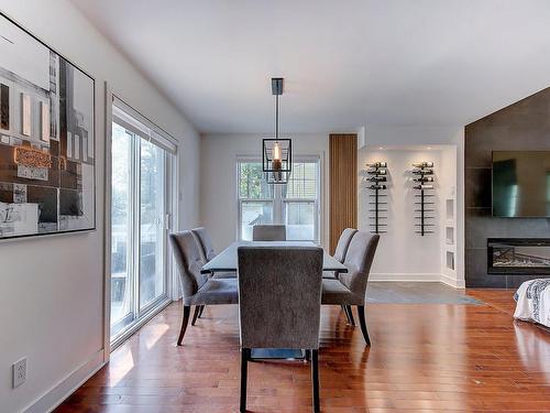 Salle Ã  manger - 113 Rue Marchesseault, Farnham, QC - Indoor Photo Showing Dining Room With Fireplace