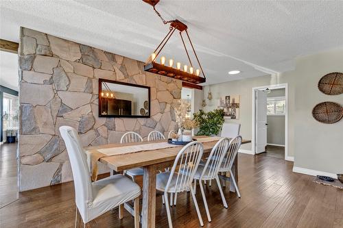 6524 Apollo Road, Vernon, BC - Indoor Photo Showing Dining Room With Fireplace