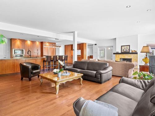 Salon - 42A Av. Du Golf, Pointe-Claire, QC - Indoor Photo Showing Living Room With Fireplace