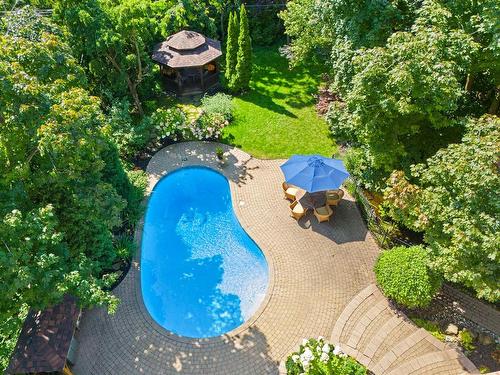 Backyard - 42A Av. Du Golf, Pointe-Claire, QC - Outdoor With In Ground Pool