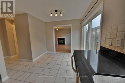 1652 Beaty Trail, Milton (Beaty), ON - Indoor Photo Showing Other Room With Fireplace