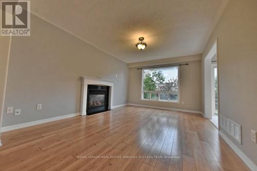 1652 Beaty Trail, Milton (Beaty), ON - Indoor Photo Showing Living Room With Fireplace