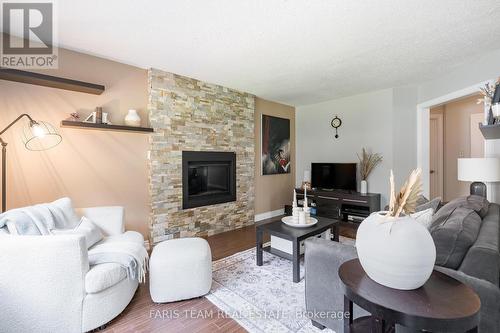 142 Livingstone Street W, Barrie, ON - Indoor Photo Showing Living Room With Fireplace