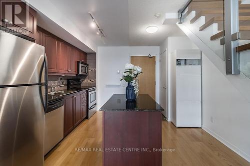 916 - 1040 The Queens Way, Toronto (Islington-City Centre West), ON - Indoor Photo Showing Kitchen With Stainless Steel Kitchen With Double Sink