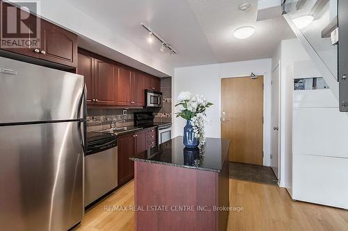 916 - 1040 The Queens Way, Toronto (Islington-City Centre West), ON - Indoor Photo Showing Kitchen With Stainless Steel Kitchen With Double Sink