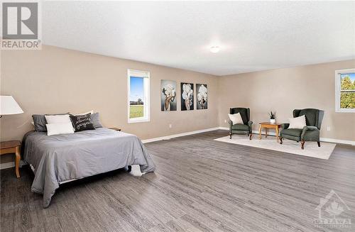 11161 Sandy Row Road, South Mountain, ON - Indoor Photo Showing Bedroom