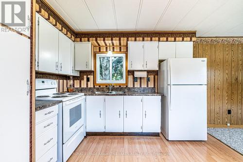 9 Marlene Drive, Kawartha Lakes (Janetville), ON - Indoor Photo Showing Kitchen With Double Sink