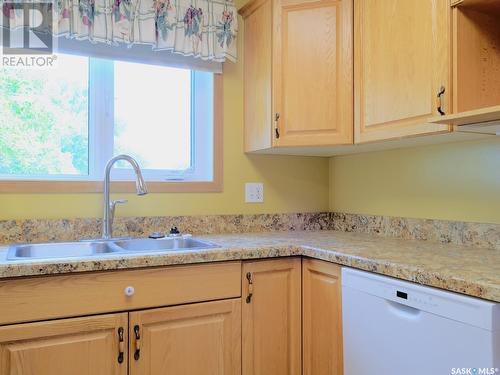 202 212 3Rd Avenue E, Rosetown, SK - Indoor Photo Showing Kitchen With Double Sink