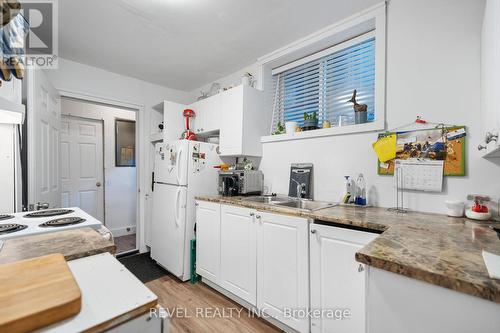 4464 Sixth Avenue, Niagara Falls (Downtown), ON - Indoor Photo Showing Kitchen With Double Sink