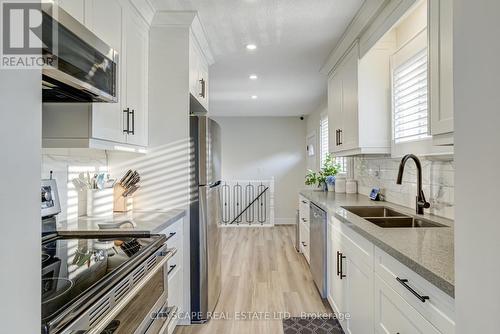 36 Telfer Court, Brant (Paris), ON - Indoor Photo Showing Kitchen With Stainless Steel Kitchen With Double Sink With Upgraded Kitchen