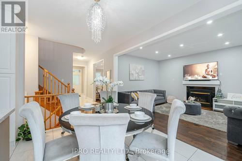 14 Valleywest Road, Brampton (Vales Of Castlemore), ON - Indoor Photo Showing Dining Room With Fireplace