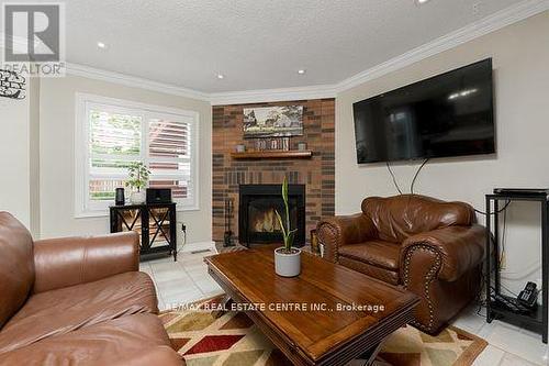 53 Mckinnon Avenue, Halton Hills (Georgetown), ON - Indoor Photo Showing Living Room With Fireplace