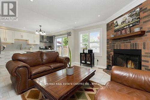 53 Mckinnon Avenue, Halton Hills (Georgetown), ON - Indoor Photo Showing Living Room With Fireplace