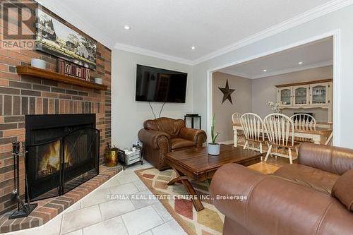 53 Mckinnon Avenue, Halton Hills (Georgetown), ON - Indoor Photo Showing Living Room With Fireplace