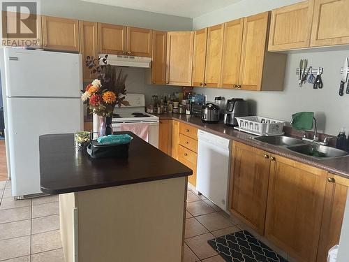 7924 89 Avenue, Fort St. John, BC - Indoor Photo Showing Kitchen With Double Sink