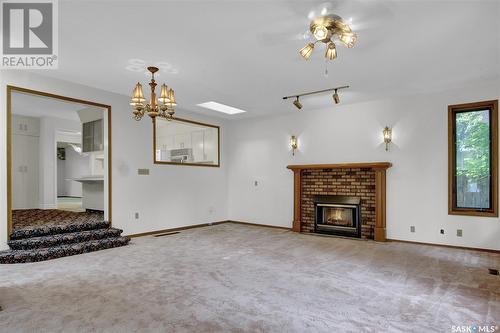 1714 Uhrich Avenue, Regina, SK - Indoor Photo Showing Living Room With Fireplace